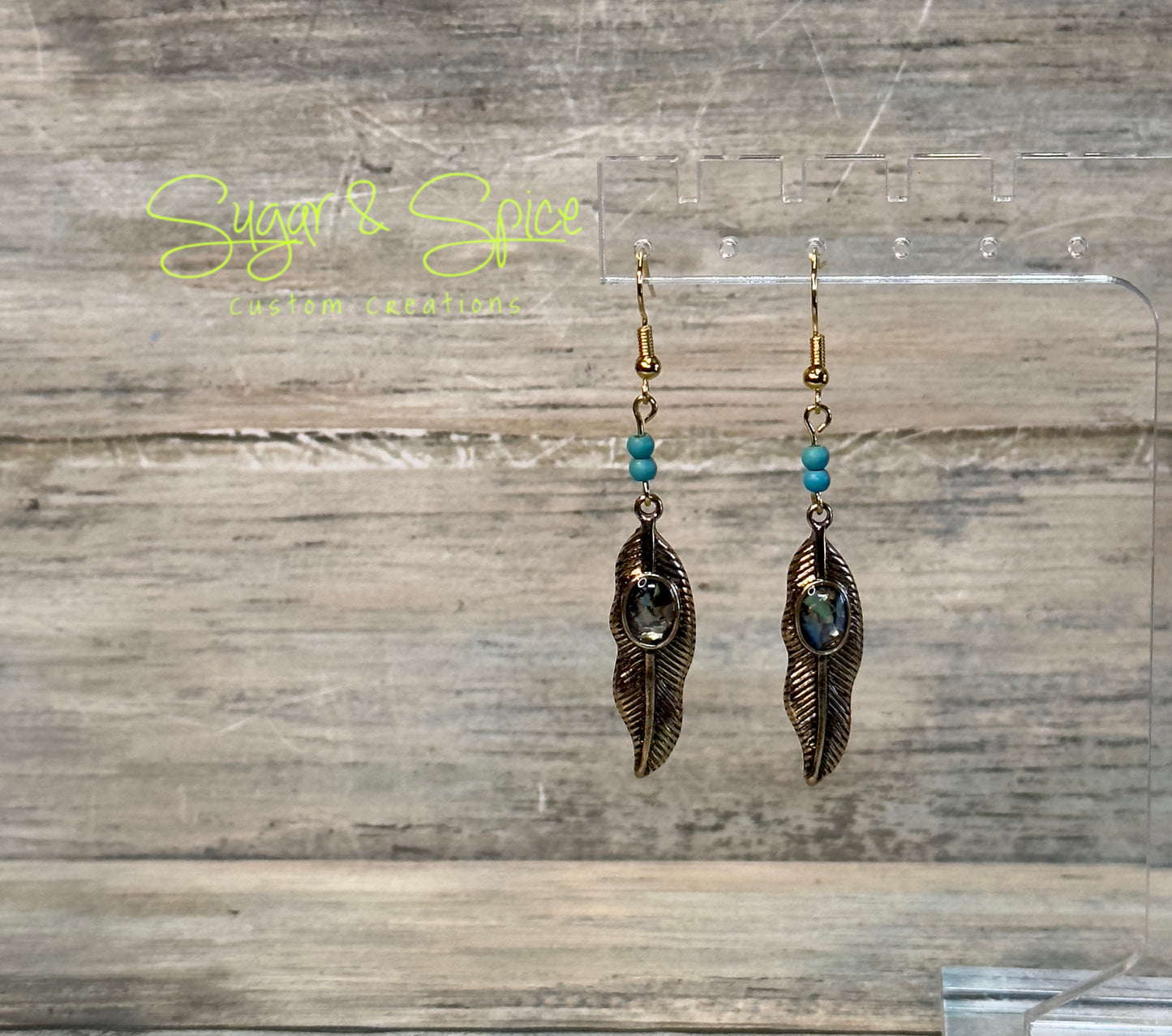 Gold Simmer Feather Dangle Earrings